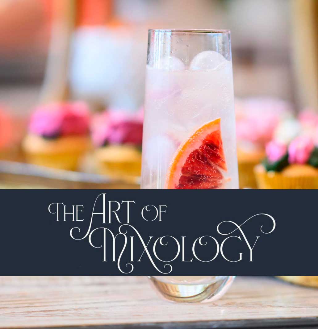 A photograph of a tall clear cocktail glass holding ice and fruit is the background of a banner