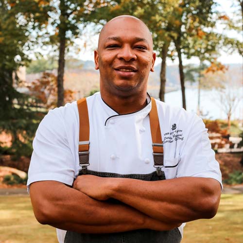 Executive Chef Dennis Vanterpool stand inside the hotel.